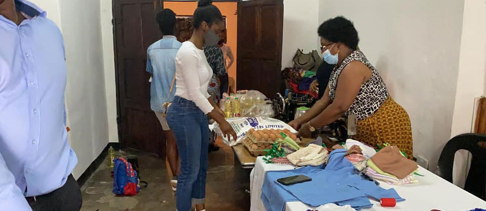 Miss Africa Chinyanta distributes food packs for the new year